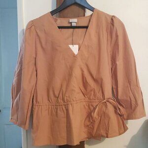 A new day wrap blouse size medium in pink
